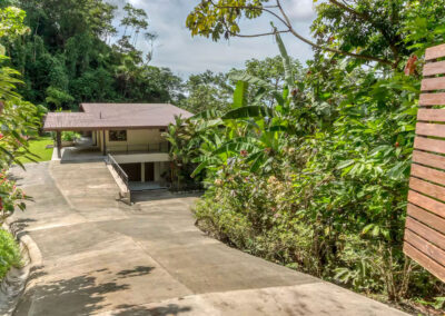 Private gate opening to the driveway leading to the carport/front entry to upper level and lower level.