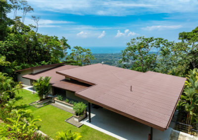 Overhead drone view of the roof of Villa Ballena vacation rental in Uvita, Costa Rica, surrounded by lush rainforest.
