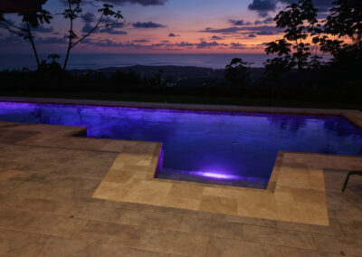 Infinity pool at Villa Ballena overlooking the Pacific Ocean at sunset in Uvita, Costa Rica
